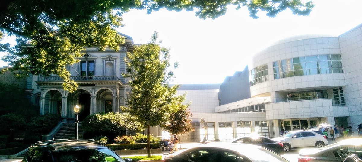 The Crocker's Victorian mansion beside its 2010 addition