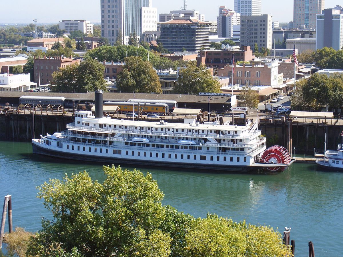 The sternwheeler Delta King moored below downtown