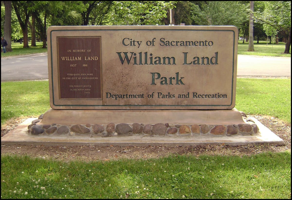 Stone gate pillars and the William Land Park sign